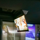 A close-up of the ceiling of LG Display's autonomous concept car showing the ceiling protrusion the vehicle's retractable OLED screens roll up in to.